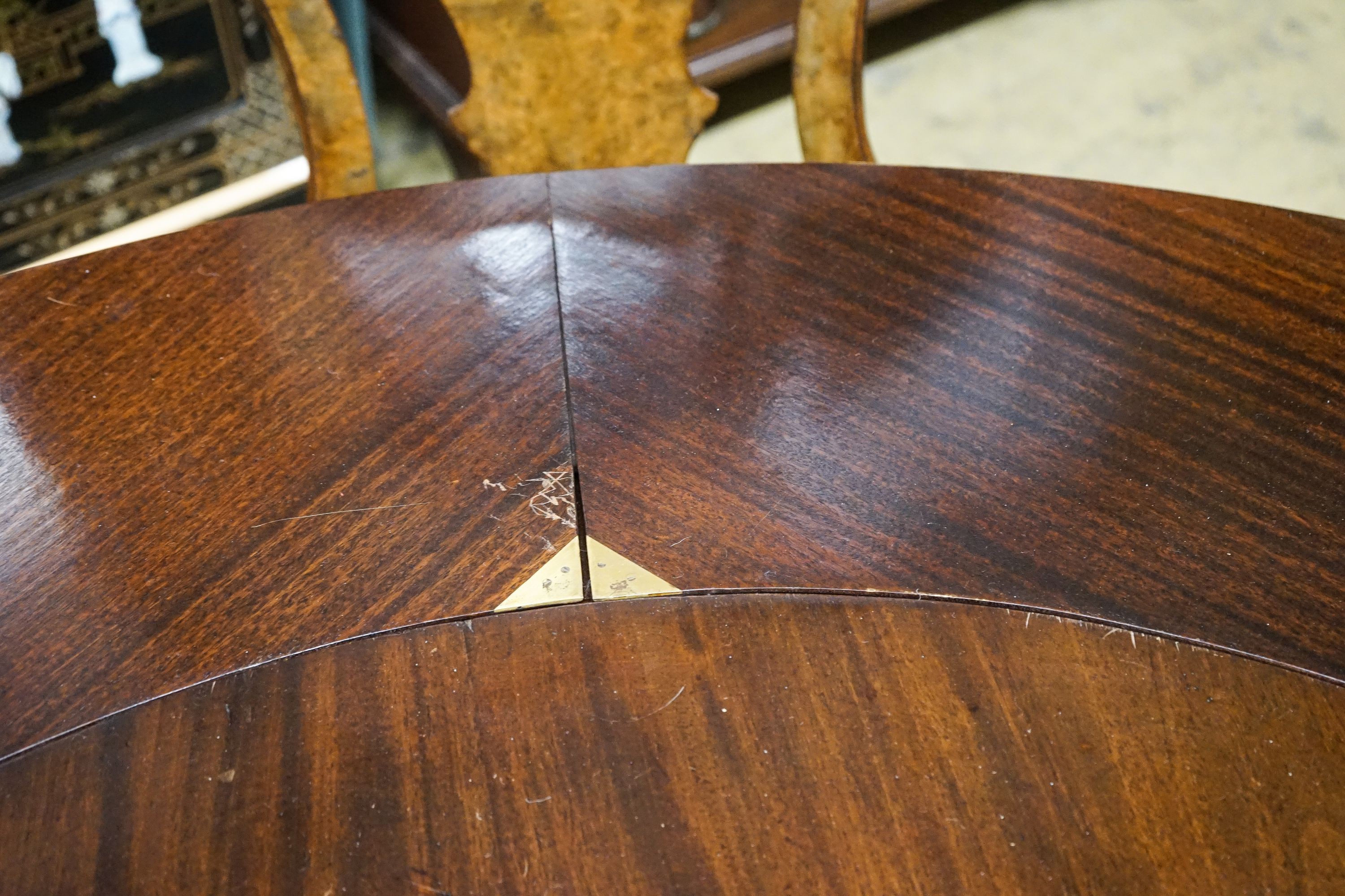 A Victorian and later circular mahogany extending dining table, 170cm diameter, height 70cm